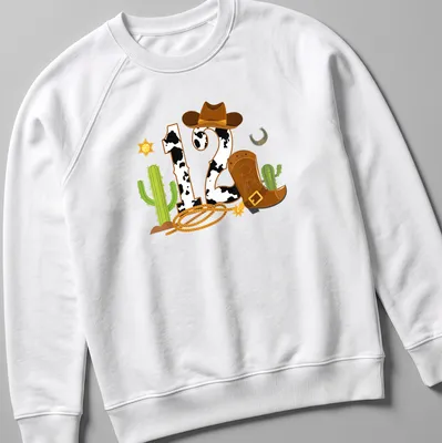 Colorful cartoon cowboy elements with a large '12' for birthdays — printed on a unisex sweatshirt
