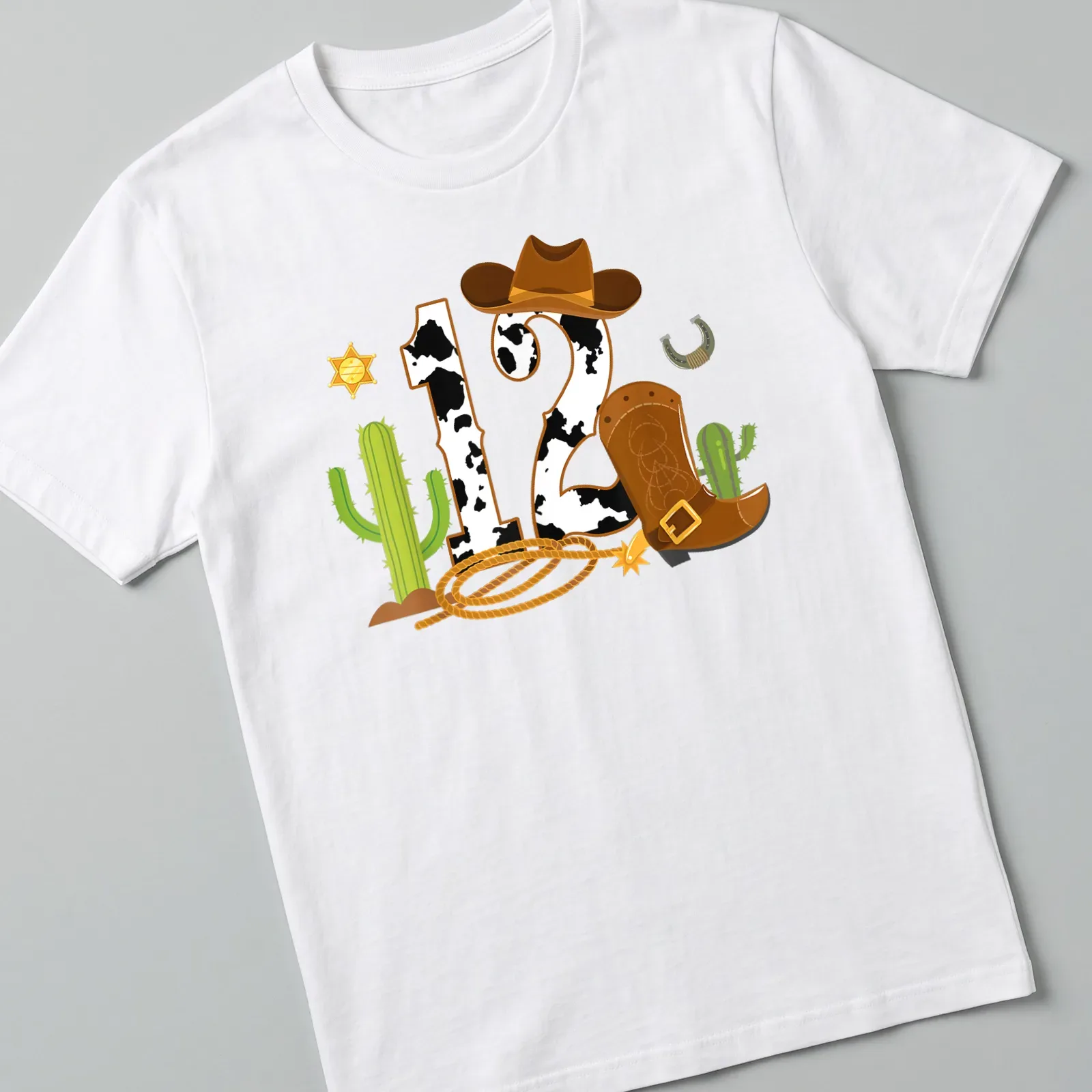 Colorful cartoon cowboy elements with a large '12' for birthdays — printed on a unisex t-shirt
