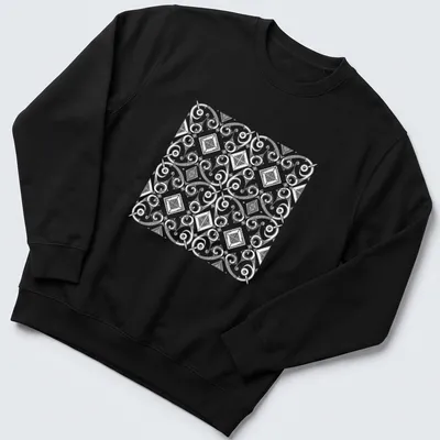 Black and white T-shirt featuring intricate African cultural patterns in geometric designs — printed on a unisex sweatshirt