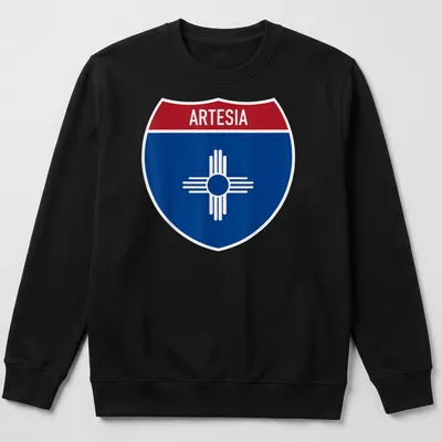 Bold graphic T-shirt featuring Arteisa highway sign in blue, red, and white — printed on a unisex sweatshirt
