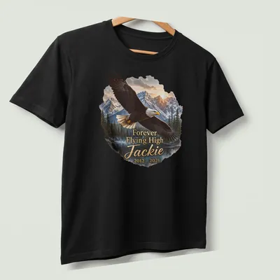 Realistic print of a Bald Eagle with text celebrating Jackie from 2012 to 2026 — printed on a unisex t-shirt (angled view)
