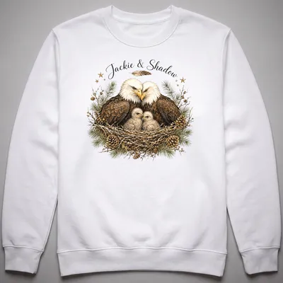 Realistic illustration of two bald eagles named Jackie and Shadow on a natural background — printed on a unisex sweatshirt