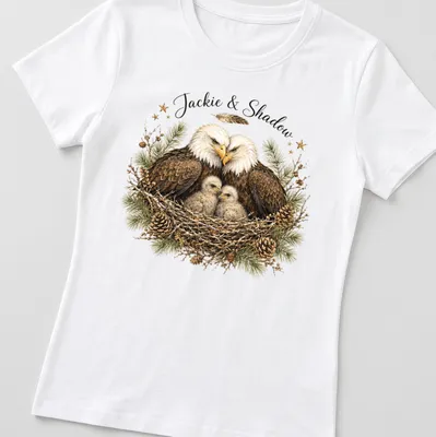 Realistic illustration of two bald eagles named Jackie and Shadow on a natural background — printed on a women's shirt