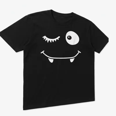 Cartoon winking face with bat eyelashes in black and white — printed on a unisex t-shirt (angled view)