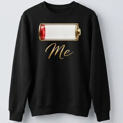 Illustration of a battery icon with the text Low Battery Me in red and gold — printed on a unisex sweatshirt