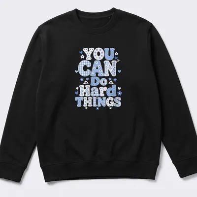 Playful blue patchwork design with the phrase 'You Can Do Hard Things' — printed on a unisex sweatshirt