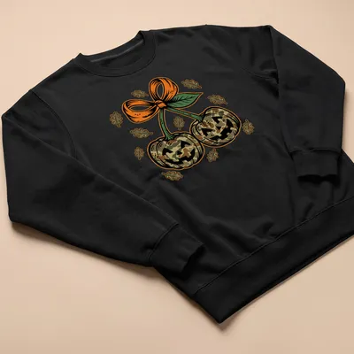 Vintage illustration of camo pumpkins with a bow in earthy colors — printed on a unisex sweatshirt