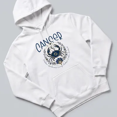 Illustrated Cancer zodiac crab with detailed traits in navy blue, gold, white, and teal — printed on a unisex hoodie