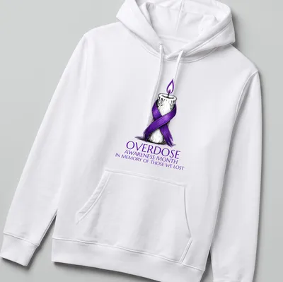 Illustration of a candle with a purple ribbon and text for overdose awareness — printed on a unisex hoodie