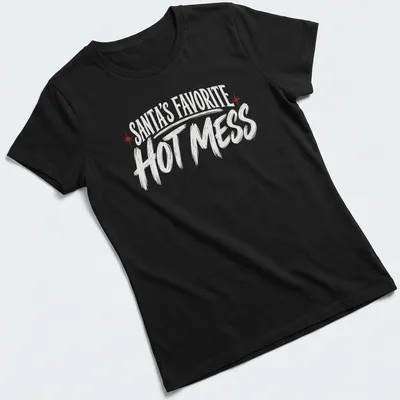 Bold typography Christmas shirt featuring 'Santa's Favorite Hot Mess' text — printed on a women's shirt