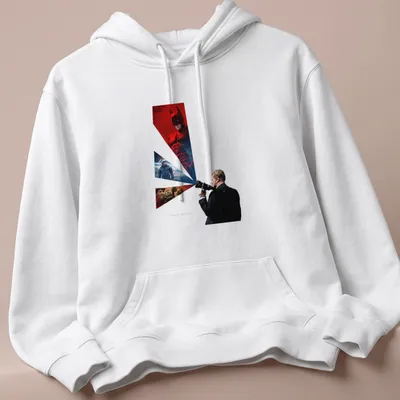 Cinematic collage design featuring characters and scenes in red, black, blue, and white — printed on a unisex hoodie