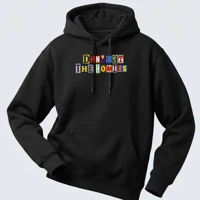 Colorful ransom note typography on a vegan-themed shirt, reading 'Don't Eat The Homies' in vibrant hues. — printed on a unisex hoodie