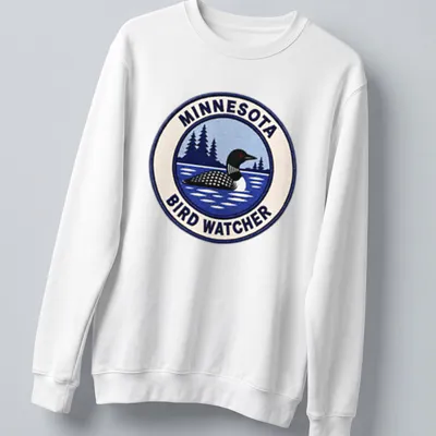 Vintage patch art featuring a Common Loon with the text Minnesota Bird Watcher — printed on a unisex sweatshirt