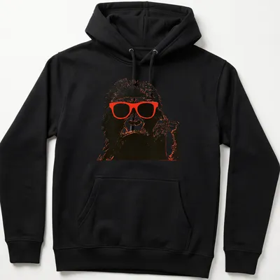 Vintage design of a chimpanzee in red sunglasses against a black and white background. — printed on a unisex hoodie