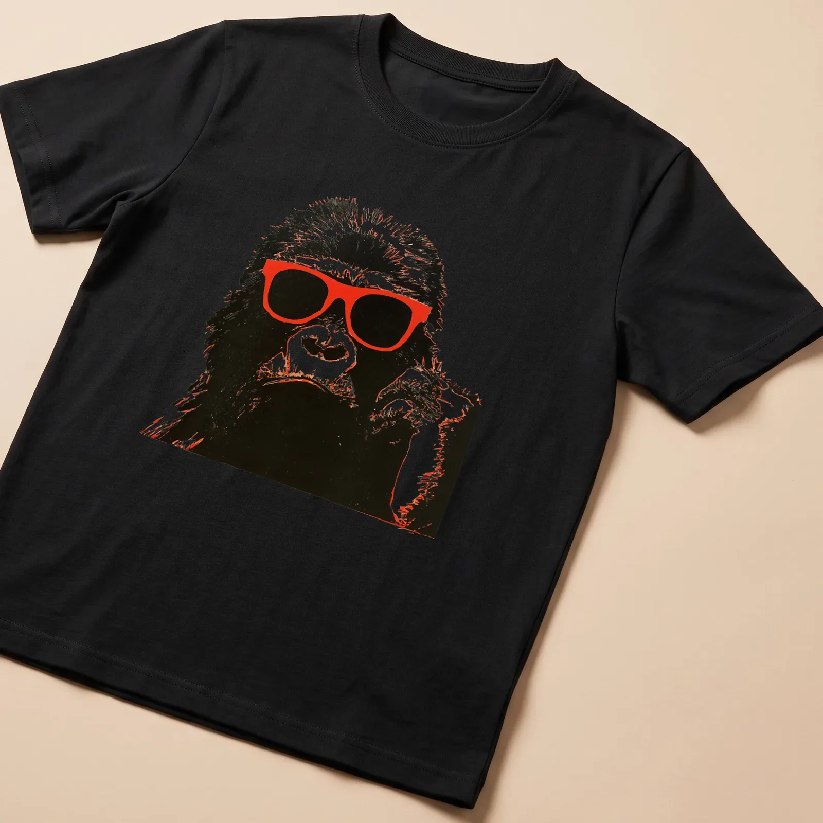 Vintage design of a chimpanzee in red sunglasses against a black and white background. — printed on a unisex t-shirt