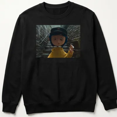 Coraline in a yellow raincoat surrounded by a whimsical background in 3D animation style — printed on a unisex sweatshirt