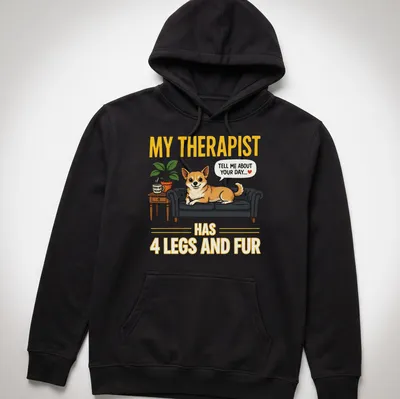 Illustrative design of a Corgi dog with the quote about therapy written above. — printed on a unisex hoodie