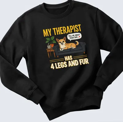 Illustrative design of a Corgi dog with the quote about therapy written above. — printed on a unisex sweatshirt