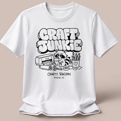 Cartoon raccoon graphic with text 'CRAFT JUNKIE CRAFTY RACOON PAHOA, HI' in black and white