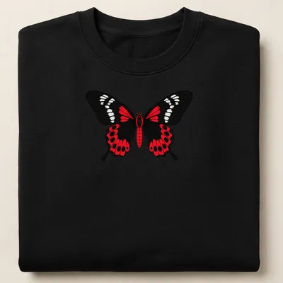 Cartoon style Crimson Rose Butterfly in black, red, and white colors — printed on a unisex sweatshirt