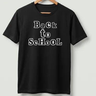 Black and white cut paper collage typography t-shirt featuring 'Back to School' text.