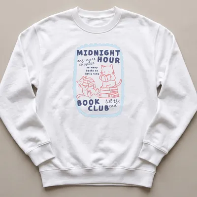 Kawaii style design of cute cats reading books in pastel colors — printed on a unisex sweatshirt