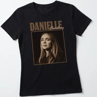 Vintage sepia t-shirt featuring the name Danielle Bradbery in elegant typography — printed on a women's shirt