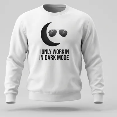Minimalist design with black sunglasses and crescent moon above the text 'I ONLY WORK IN DARK MODE' — printed on a unisex sweatshirt