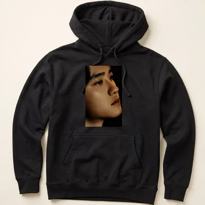 Realistic portrait of a male figure with detailed skin tones — printed on a unisex hoodie