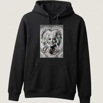 Vintage glam Dolly Parton t-shirt with colorful heart design around the name. — printed on a unisex hoodie