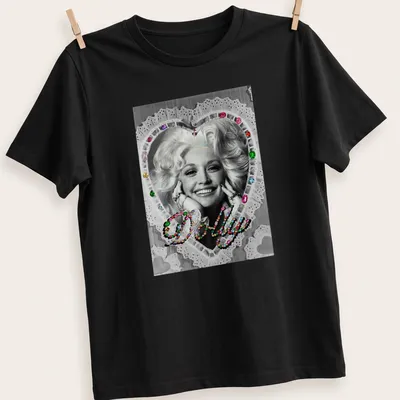 Vintage glam Dolly Parton t-shirt with colorful heart design around the name.