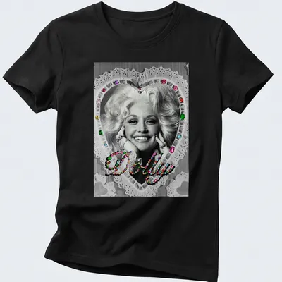 Vintage glam Dolly Parton t-shirt with colorful heart design around the name. — printed on a women's shirt