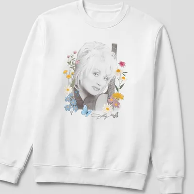 Portrait of Dolly Parton surrounded by flowers and butterflies in vibrant colors — printed on a unisex sweatshirt