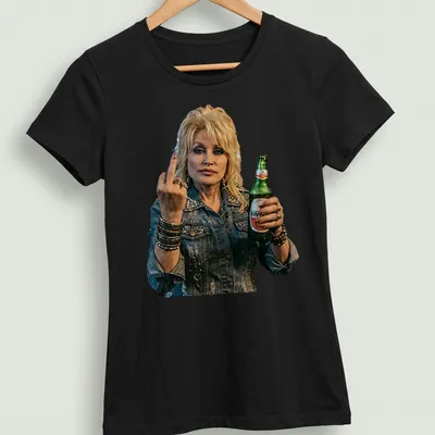 Vintage rock t-shirt featuring Dolly Parton in a stylized illustration — printed on a women's shirt
