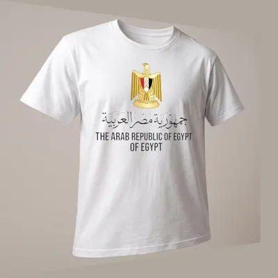 Egyptian emblem with flag in gold, black, red, and white typography — printed on a unisex t-shirt (angled view)