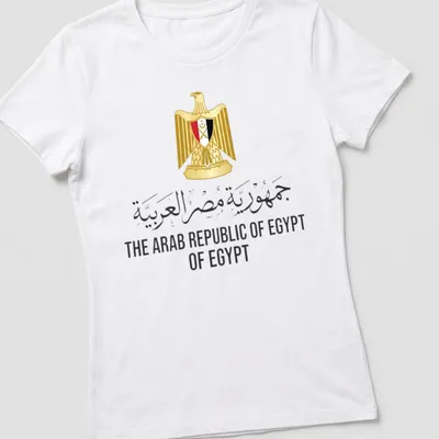 Egyptian emblem with flag in gold, black, red, and white typography — printed on a women's shirt