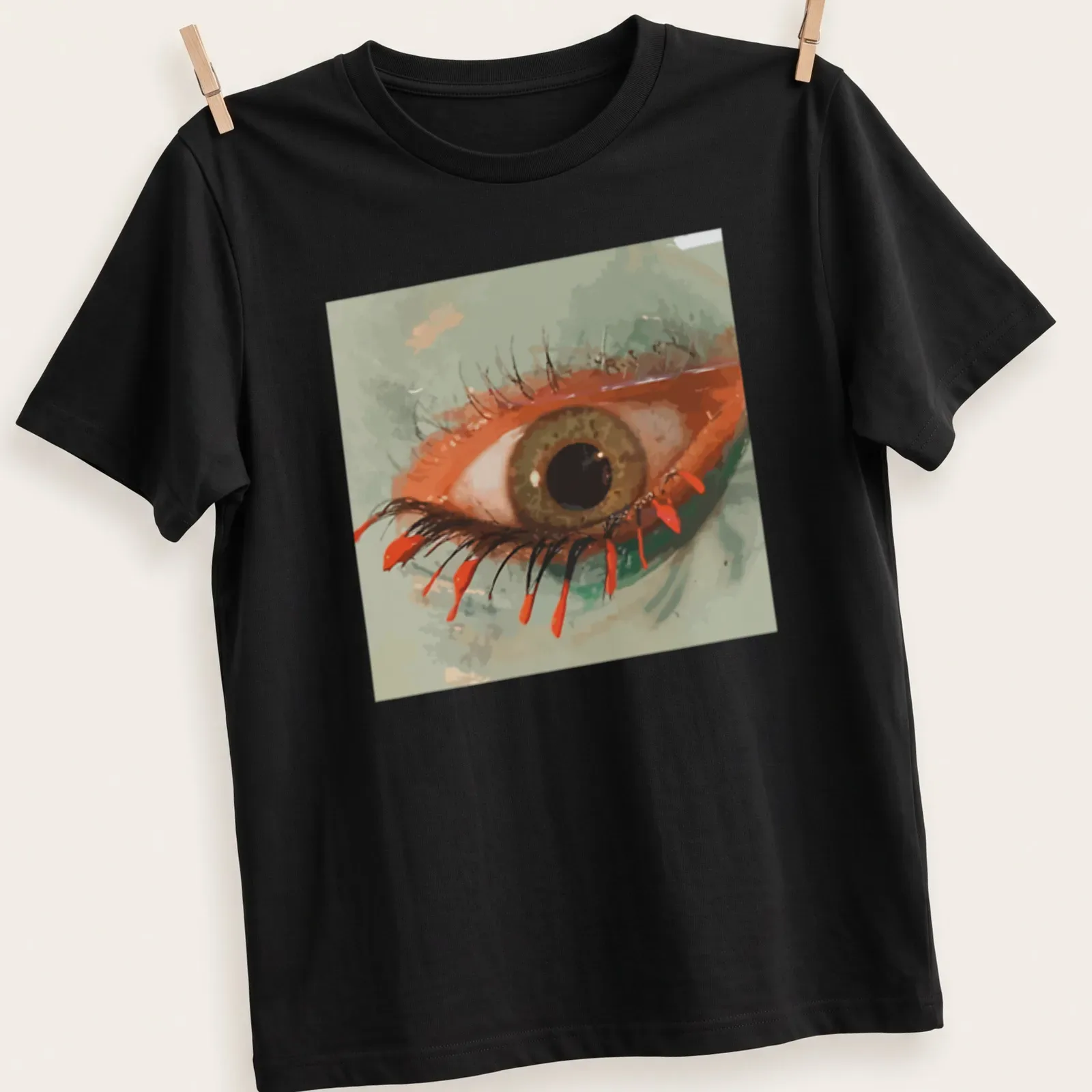 Artistic illustration of an eye with red tears, detailed in green and brown — printed on a unisex t-shirt