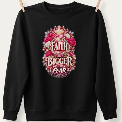 Floral design with a cross and the text 'Let Your Faith Be Bigger Than Your Fear' in vibrant colors. — printed on a unisex sweatshirt
