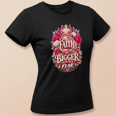 Floral design with a cross and the text 'Let Your Faith Be Bigger Than Your Fear' in vibrant colors. — printed on a women's shirt
