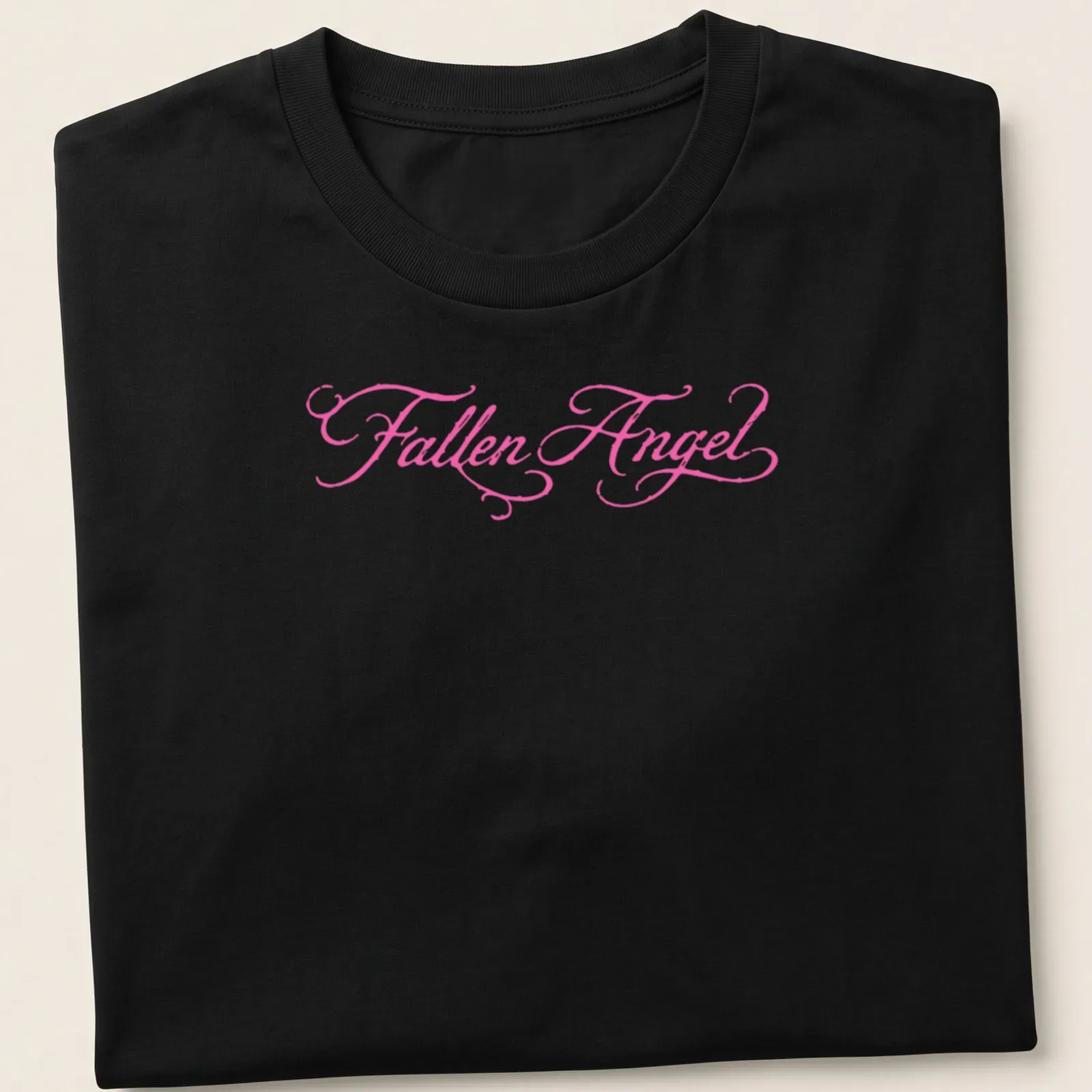 Elegant script t-shirt featuring the text 'Fallen Angel' in pink — printed on a unisex t-shirt