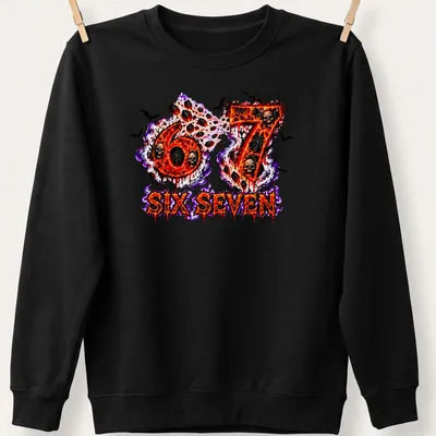 Bold graphic t-shirt featuring fiery skulls and the text 67 SIX SEVEN — printed on a unisex sweatshirt