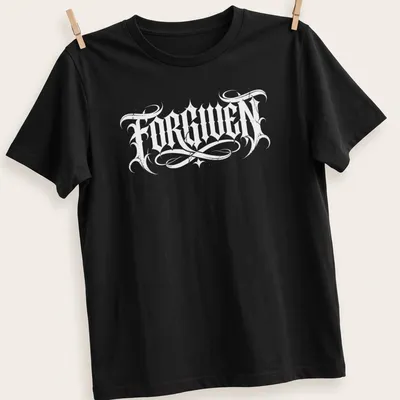 Bold black Gothic text reading FORGIVEN on a white t-shirt. — printed on a unisex t-shirt