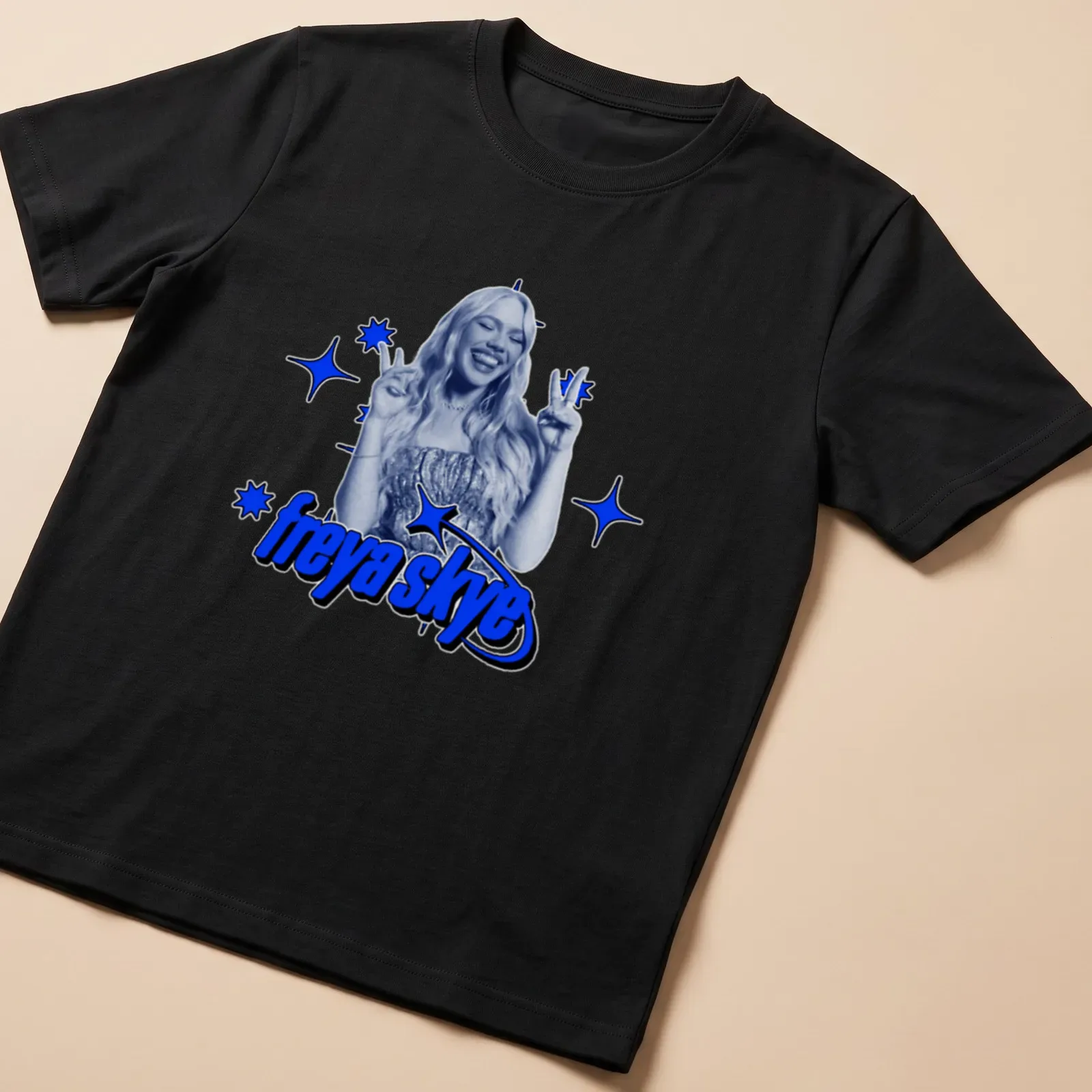 Graphic print of a woman making peace signs with the text freya skye — printed on a unisex t-shirt