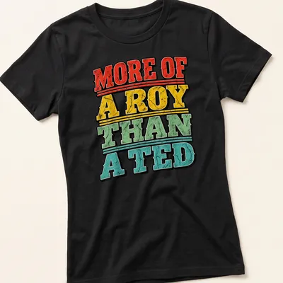 Bold distressed print saying 'More Of A Roy Than A Ted' for football fans — printed on a women's shirt