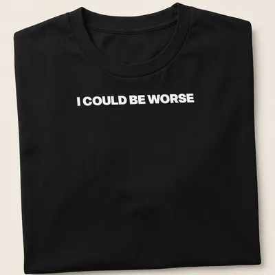 Humorous shirt with the text 'I Could Always Be Worse' in a playful font