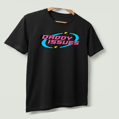 Y2K Retro t-shirt with the quote 'DADDY ISSUES' in playful colors and font — printed on a unisex t-shirt (angled view)