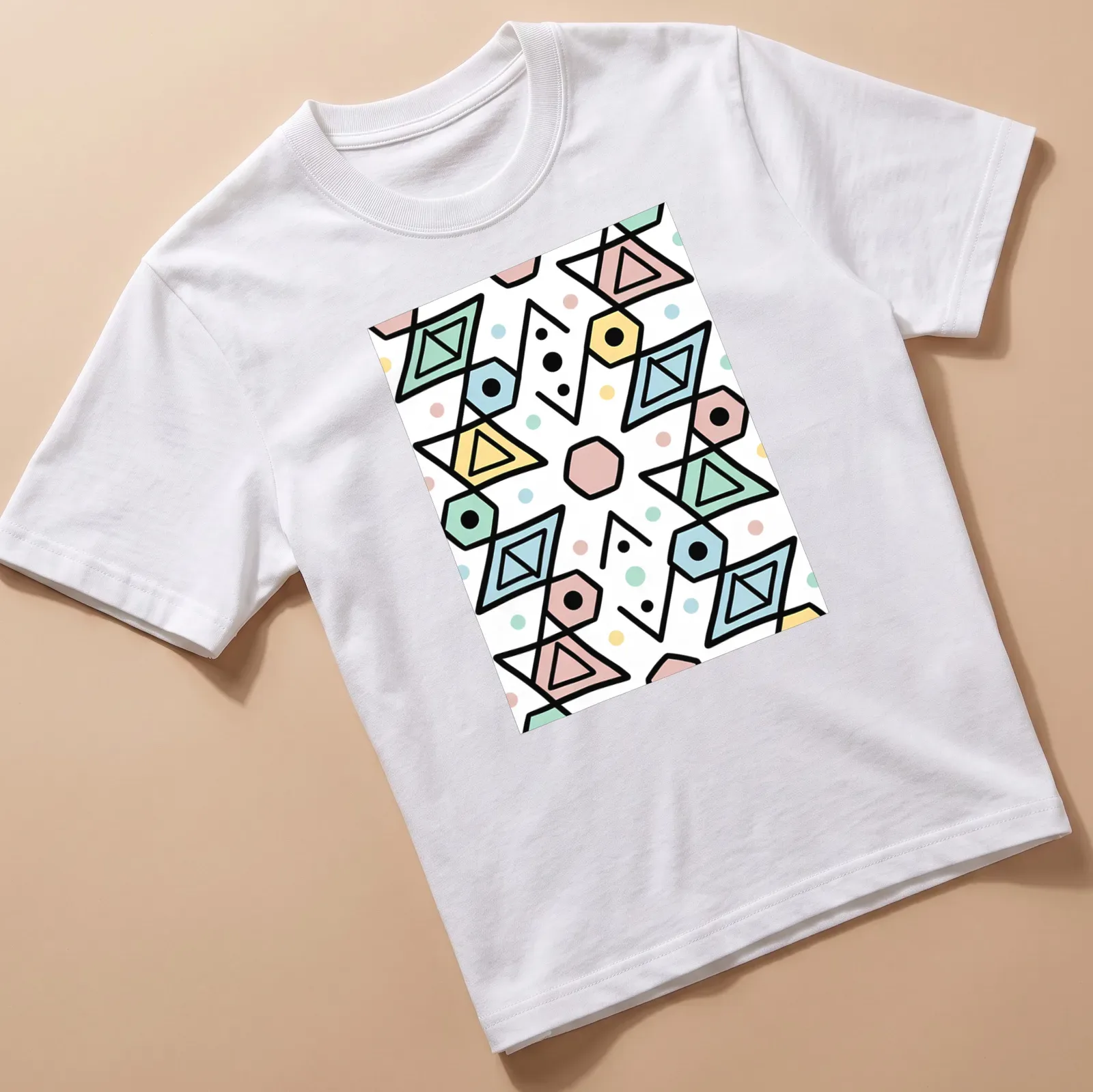 Seamless geometric pattern t-shirt in pastel colors and playful shapes — printed on a unisex t-shirt