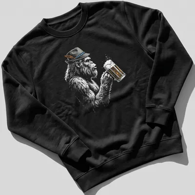 Illustration of a German Bigfoot in lederhosen holding a beer mug in sketch style — printed on a unisex sweatshirt