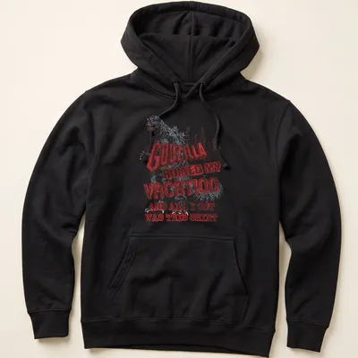 Vintage distressed Godzilla-themed T-shirt with humorous vacation text — printed on a unisex hoodie