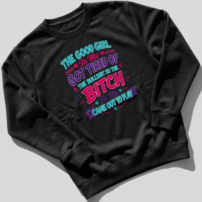 Bold colorful text on a black t-shirt, expressing sass and empowerment — printed on a unisex sweatshirt